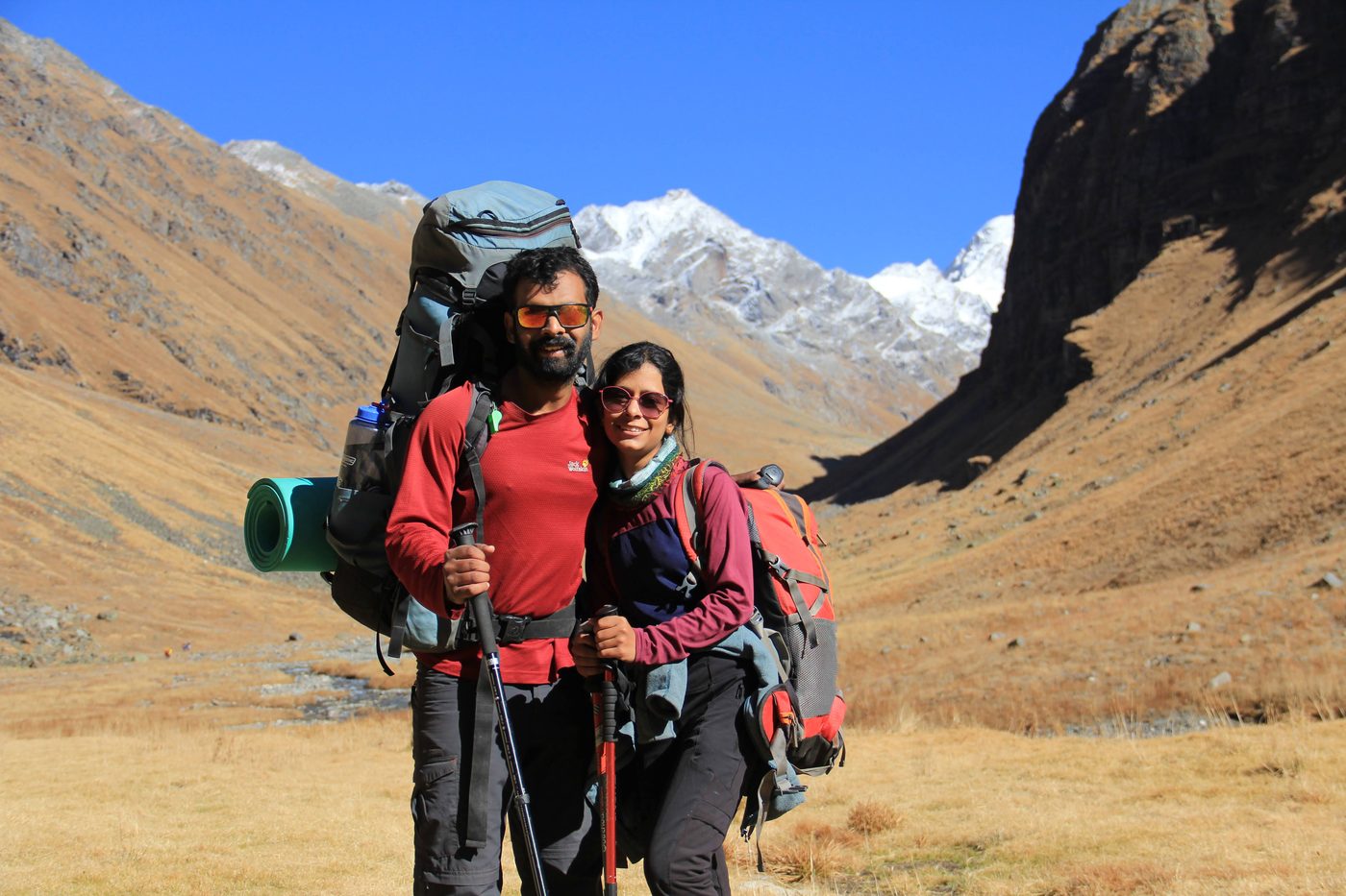 Hemant Gupta and Akanksha Goyal trekking in the Himalayas
